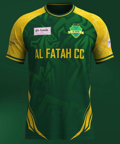 Al Fatah Cricket Club playing shirt in green and gold with the club crest